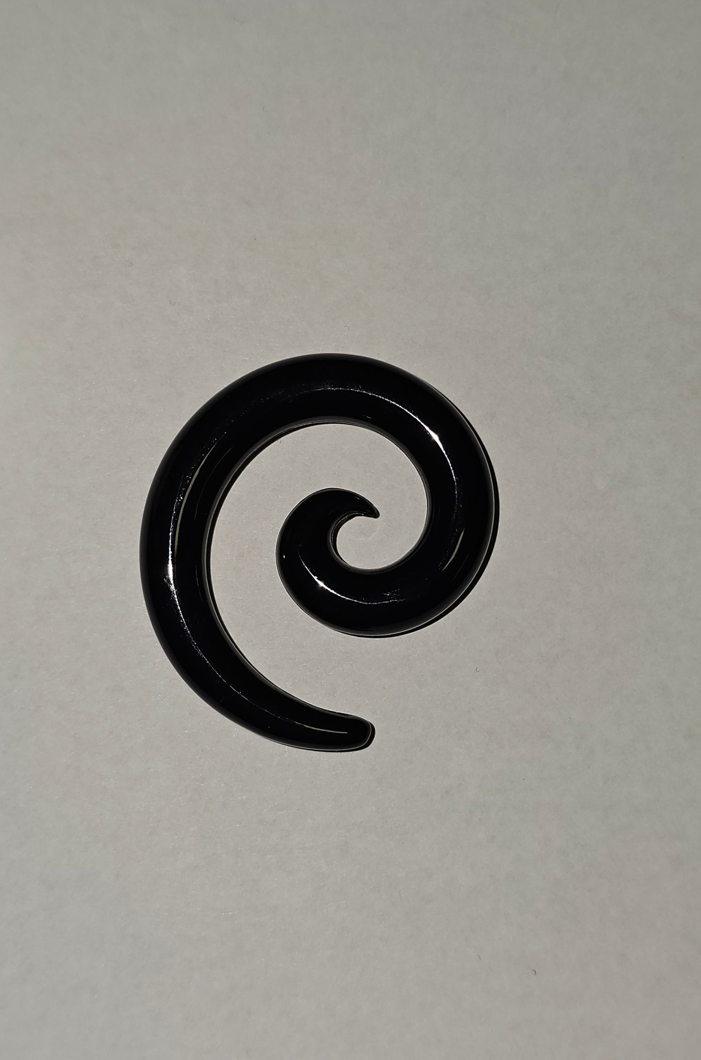 Ear streacher