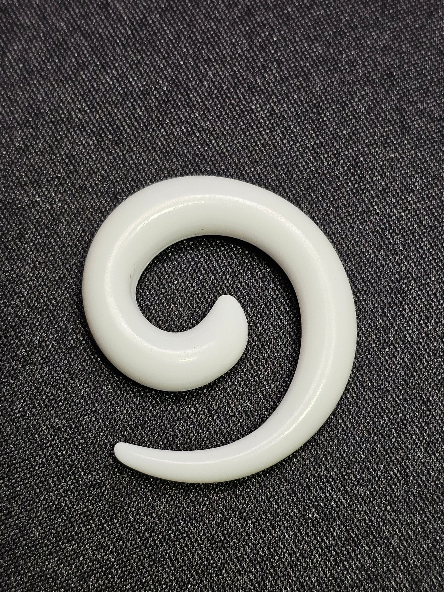 Ear streacher
