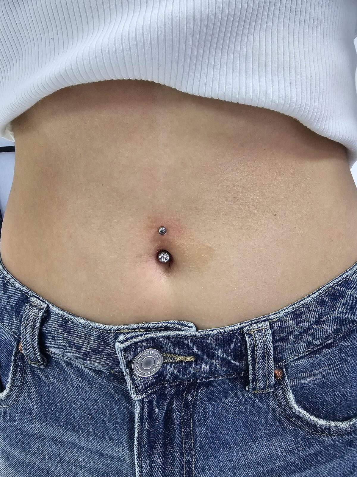 Classic navel piercing