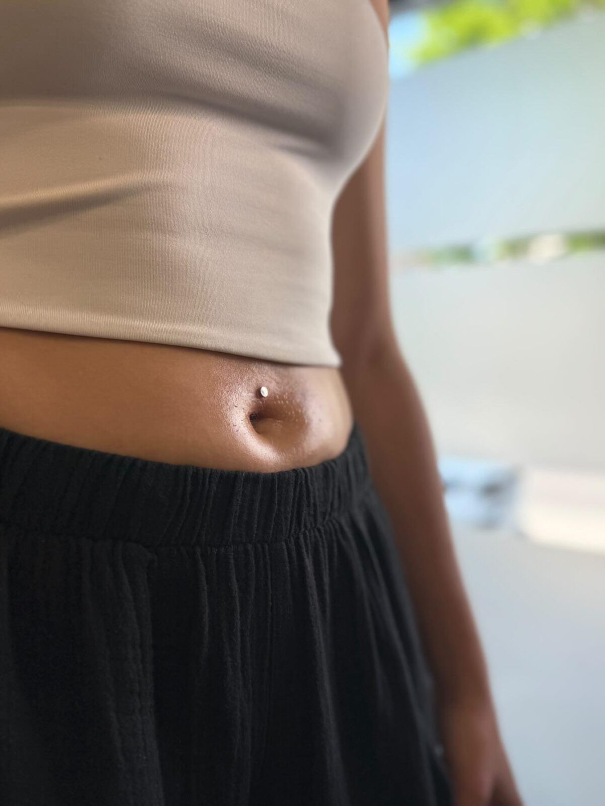 Floating navel piercing